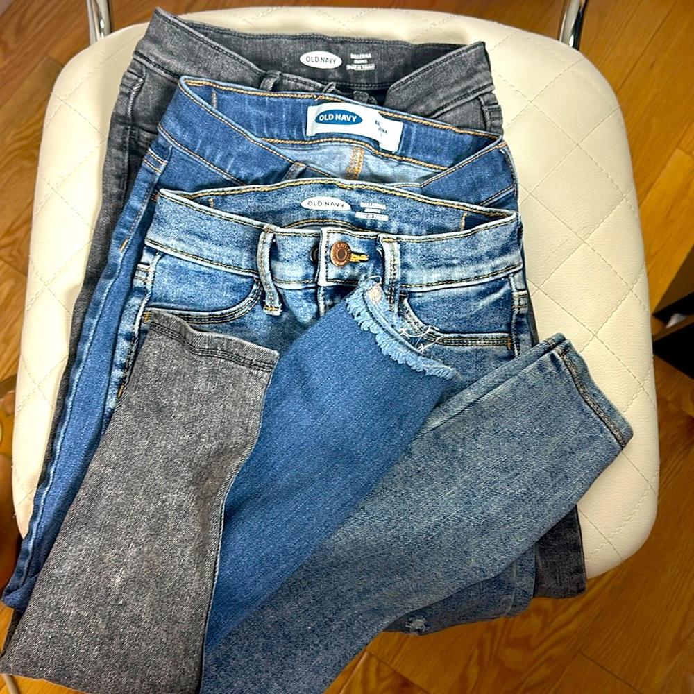 4 pairs of denim jeans. Size 7.